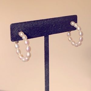 White pearl demi-hoop earrings by Honora.